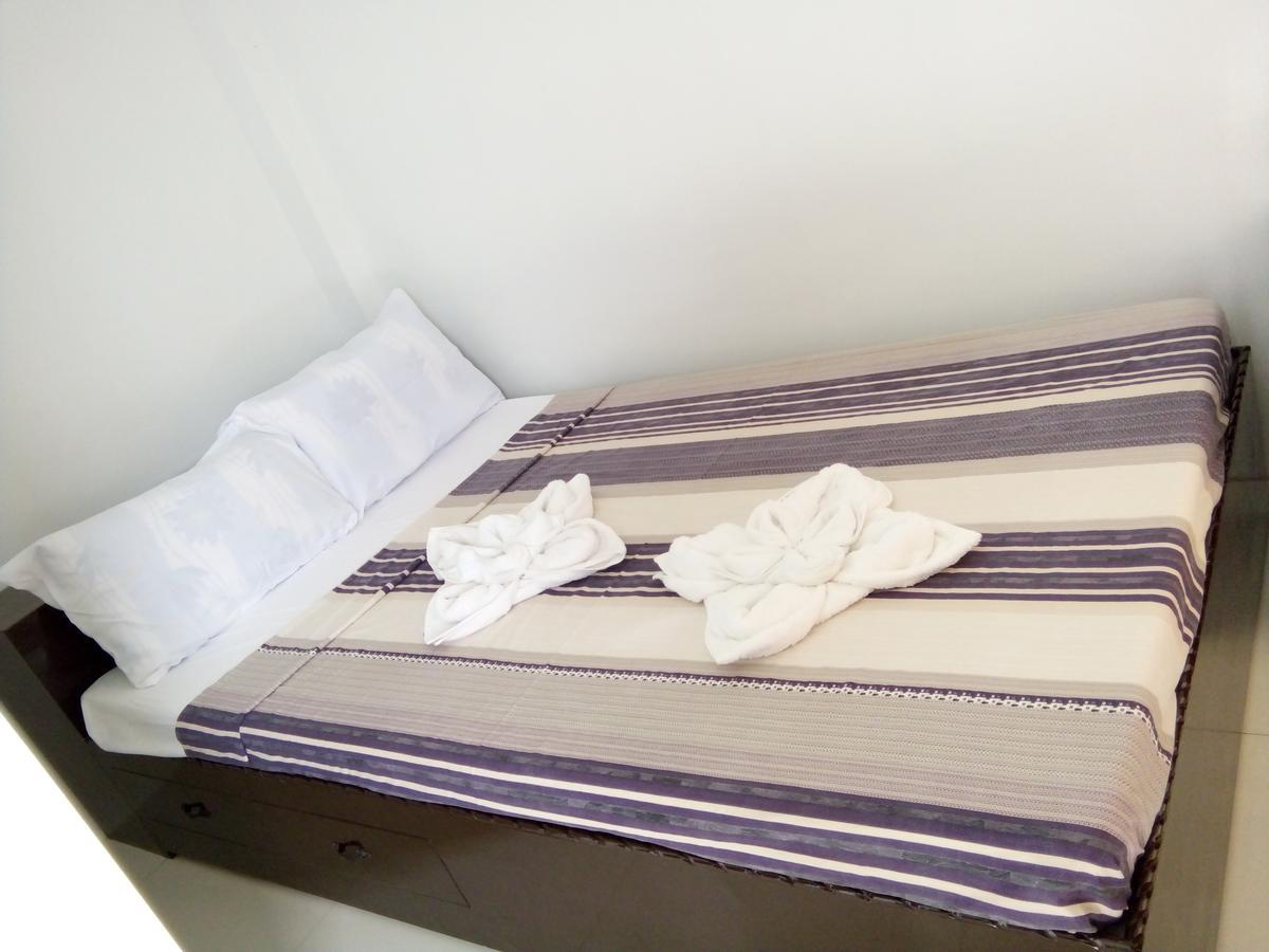 Chelle'S Apartelle - Inn Эль-Нидо Экстерьер фото