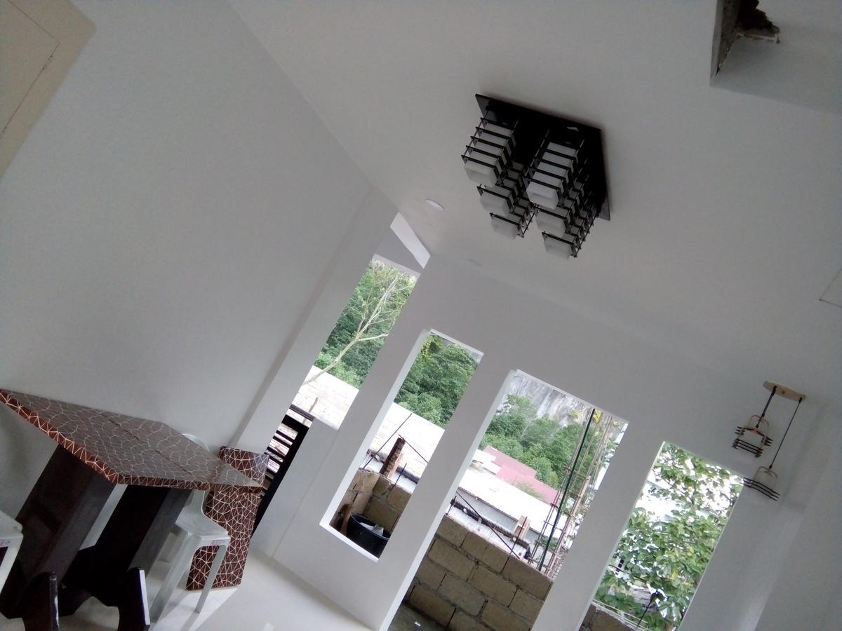 Chelle'S Apartelle - Inn Эль-Нидо Экстерьер фото